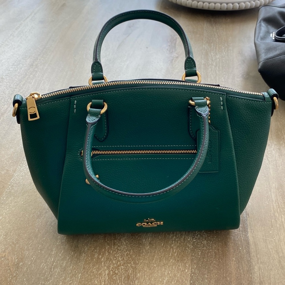 Green medium top handle coach handbag